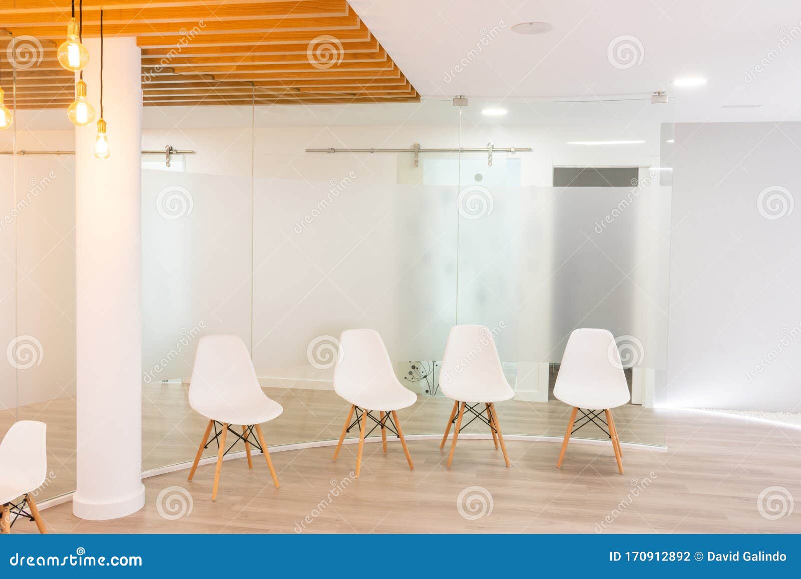 White Waiting Room Lit with Empty Chairs Stock Photo Image of hall