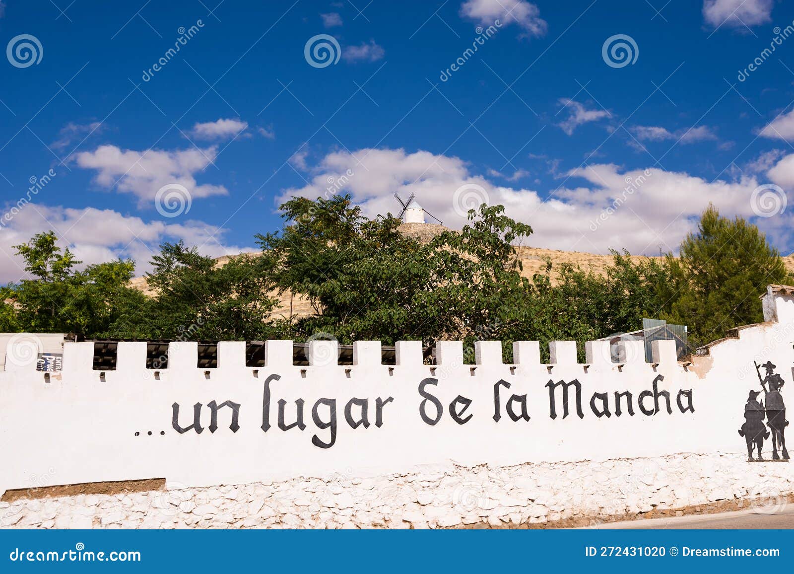 a white wall with the inscription 