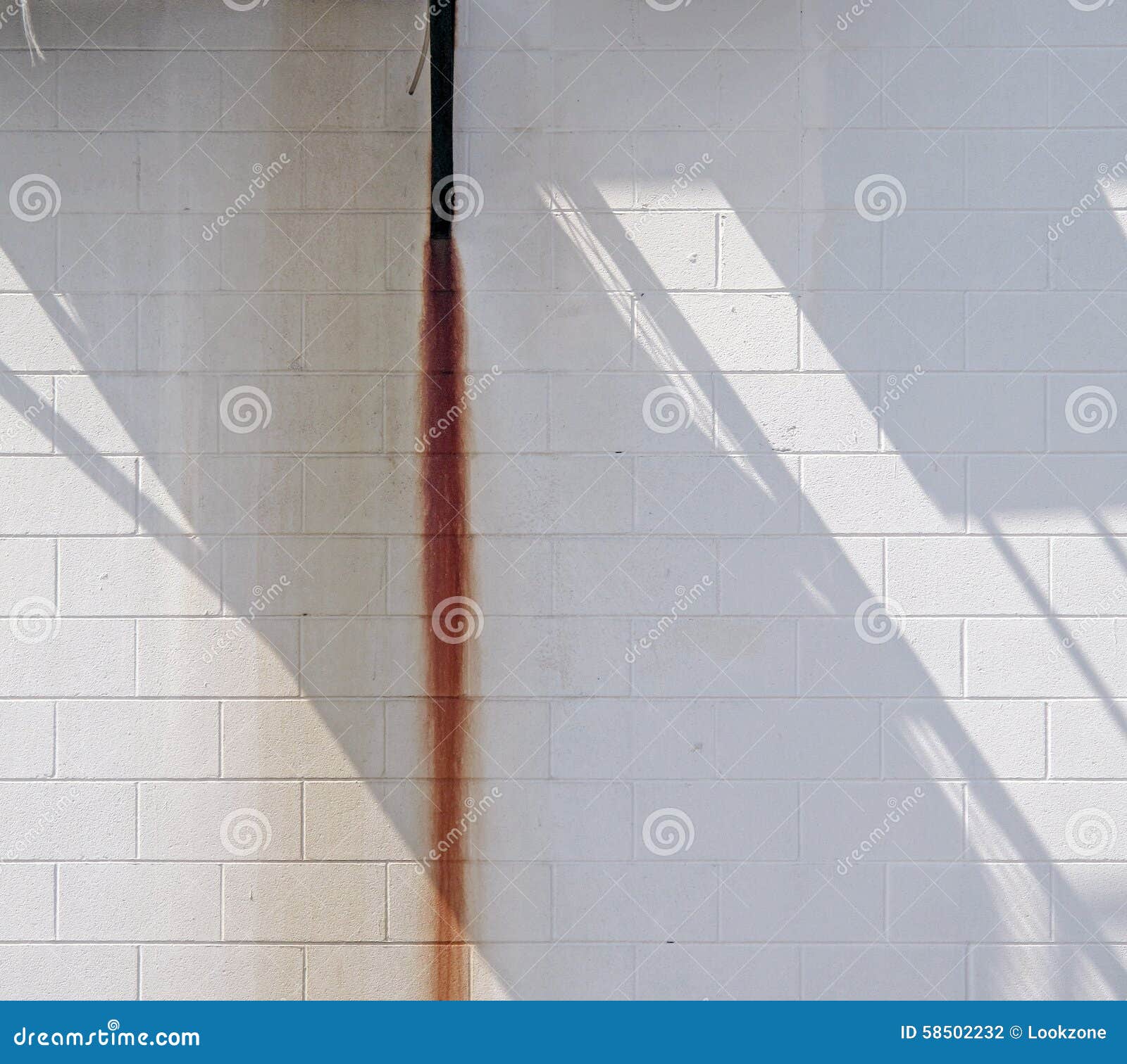 White Wall with Rust Streak and Shadow. Stock Photo Image of effects