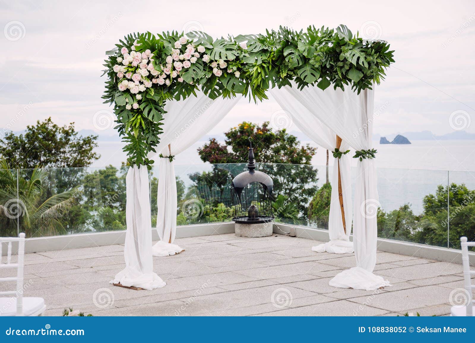 White Wedding Arch Decorated With Flowers Floral Stock