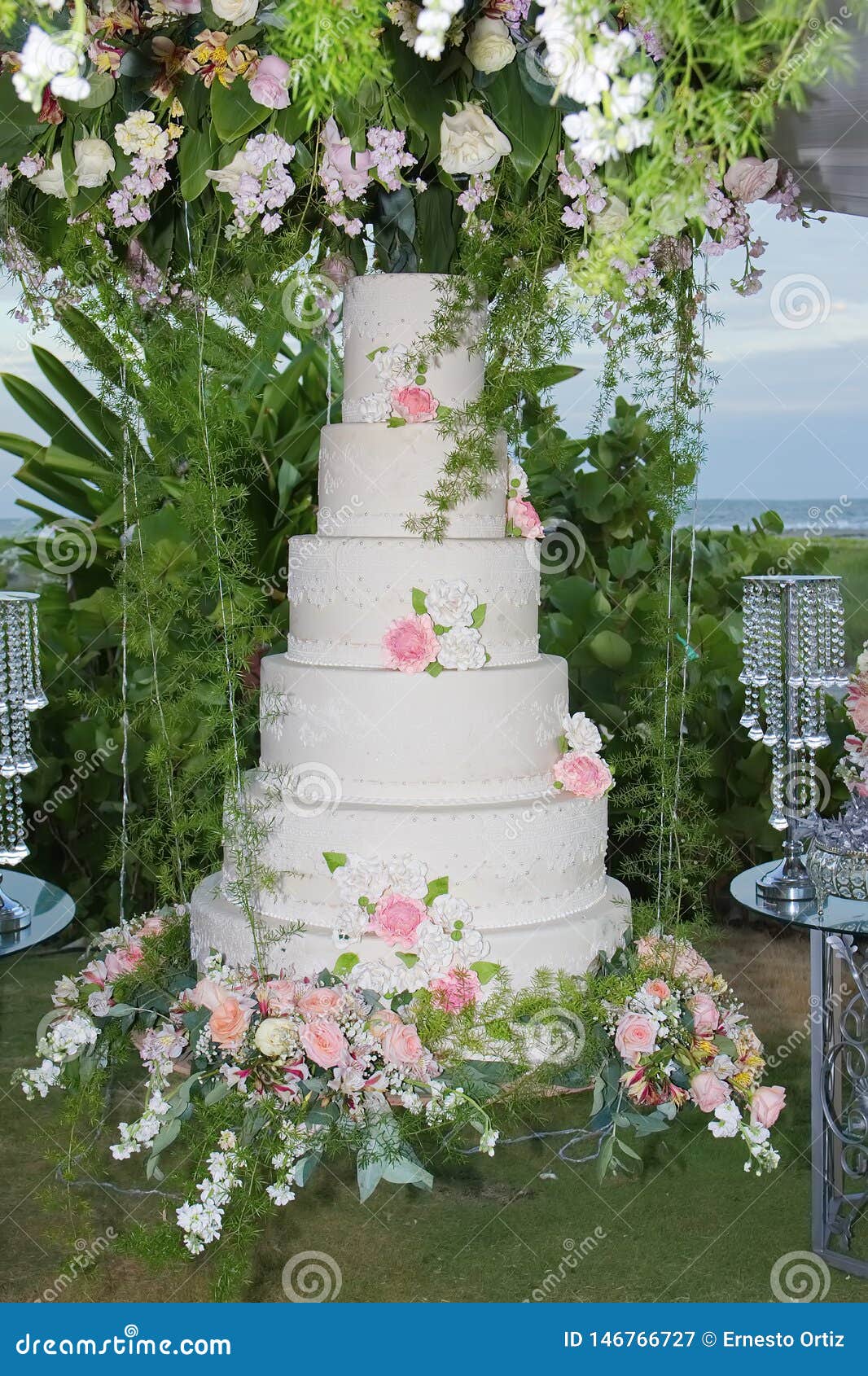 White Wedding Cake With Flowers Beach Wedding Stock Image Image
