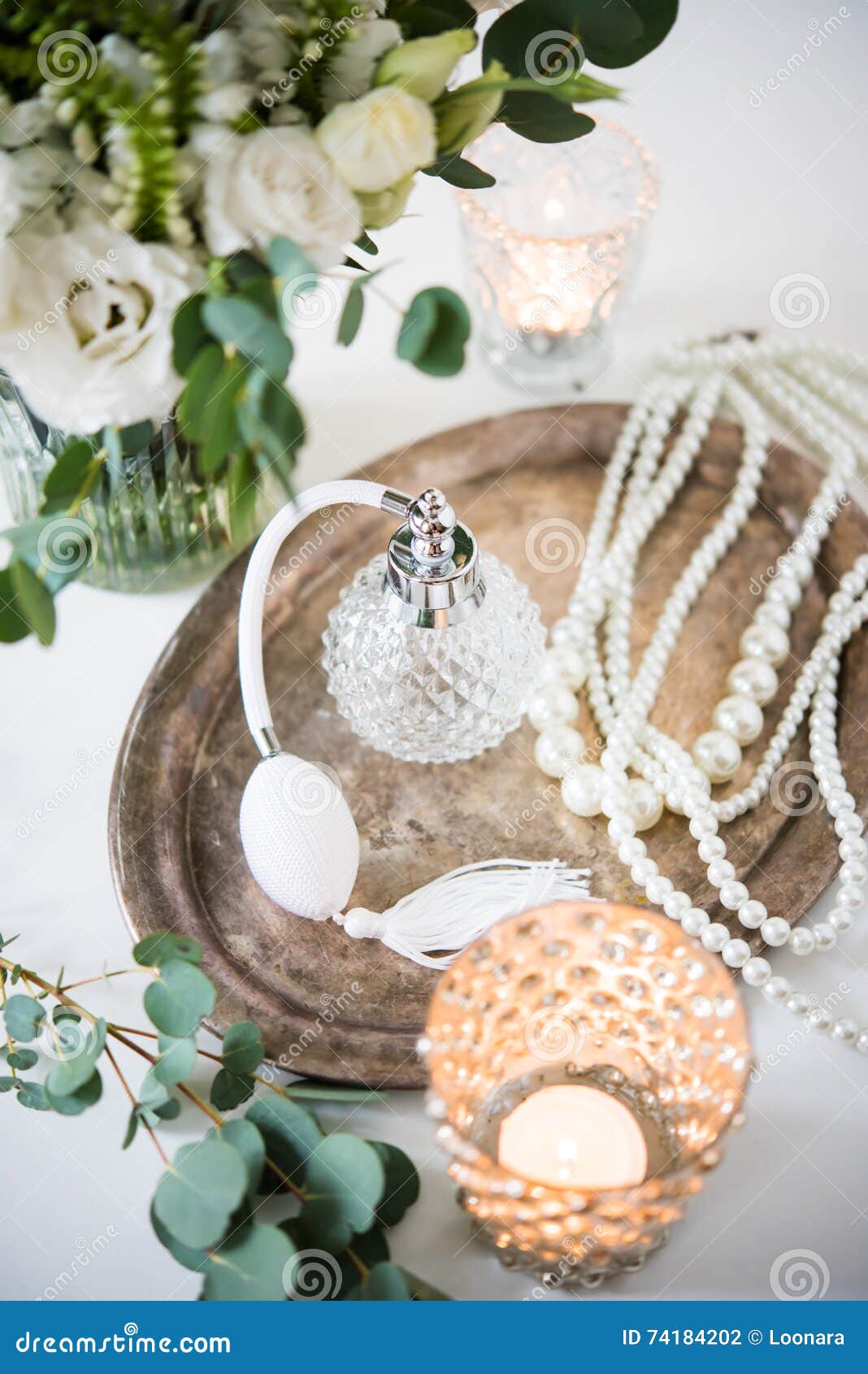 White Wedding Decor, Perfume, Pearl Beads And Bouquet Of ...