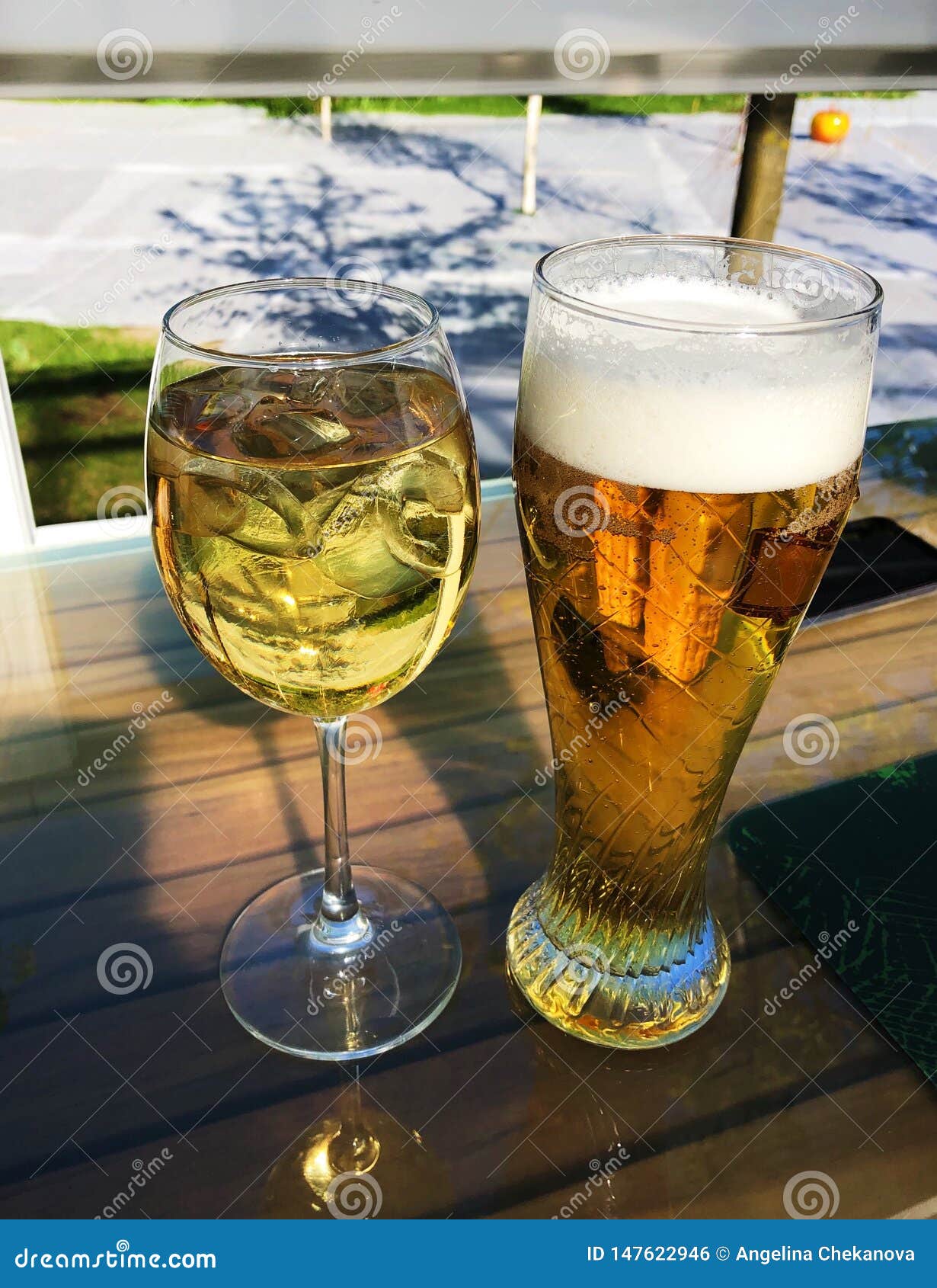 White Wine and Beer on the Table Stock Photo Image of glass, evening