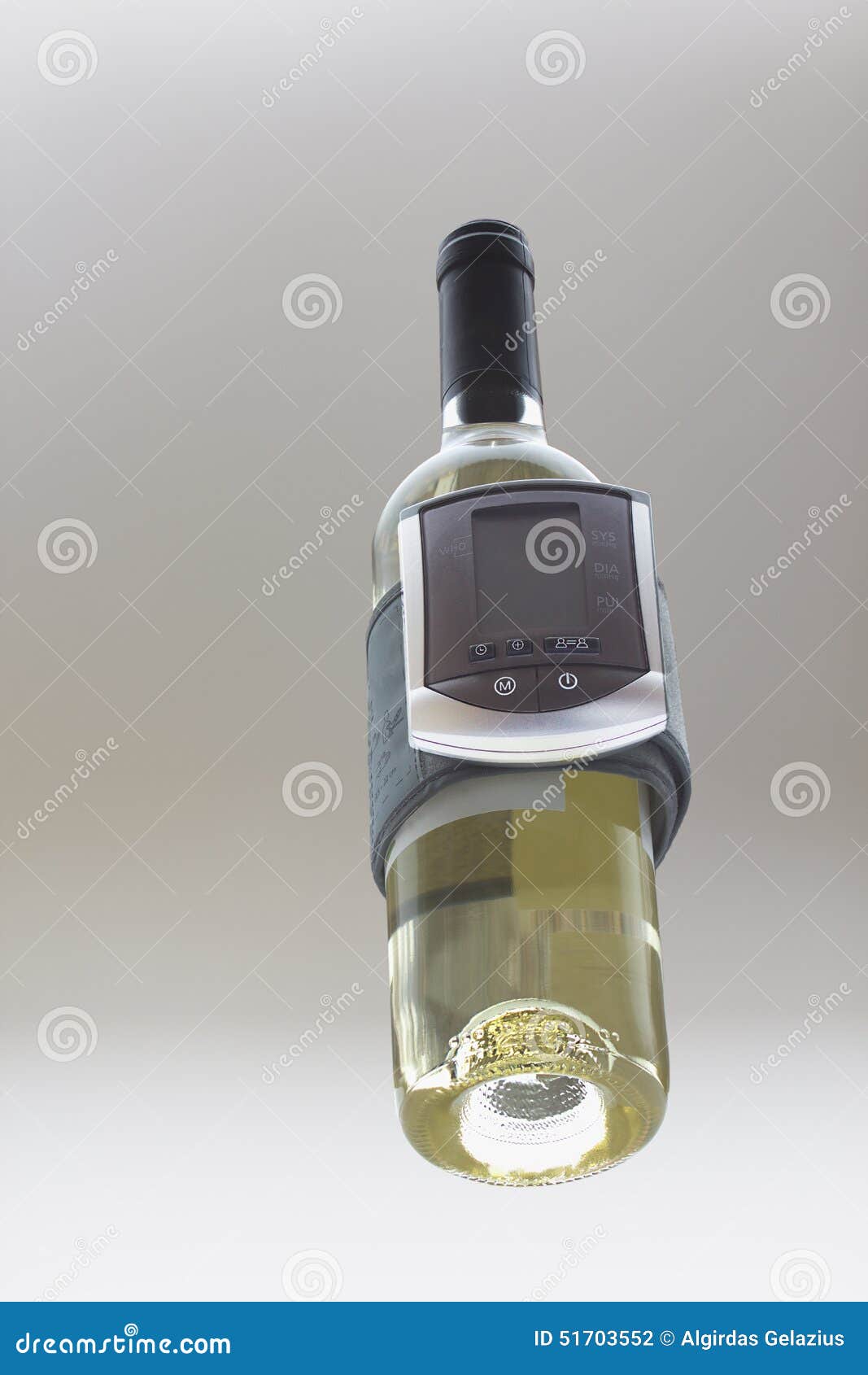 White Wine Bottle with Blood Pressure Analizing Device Stock Photo