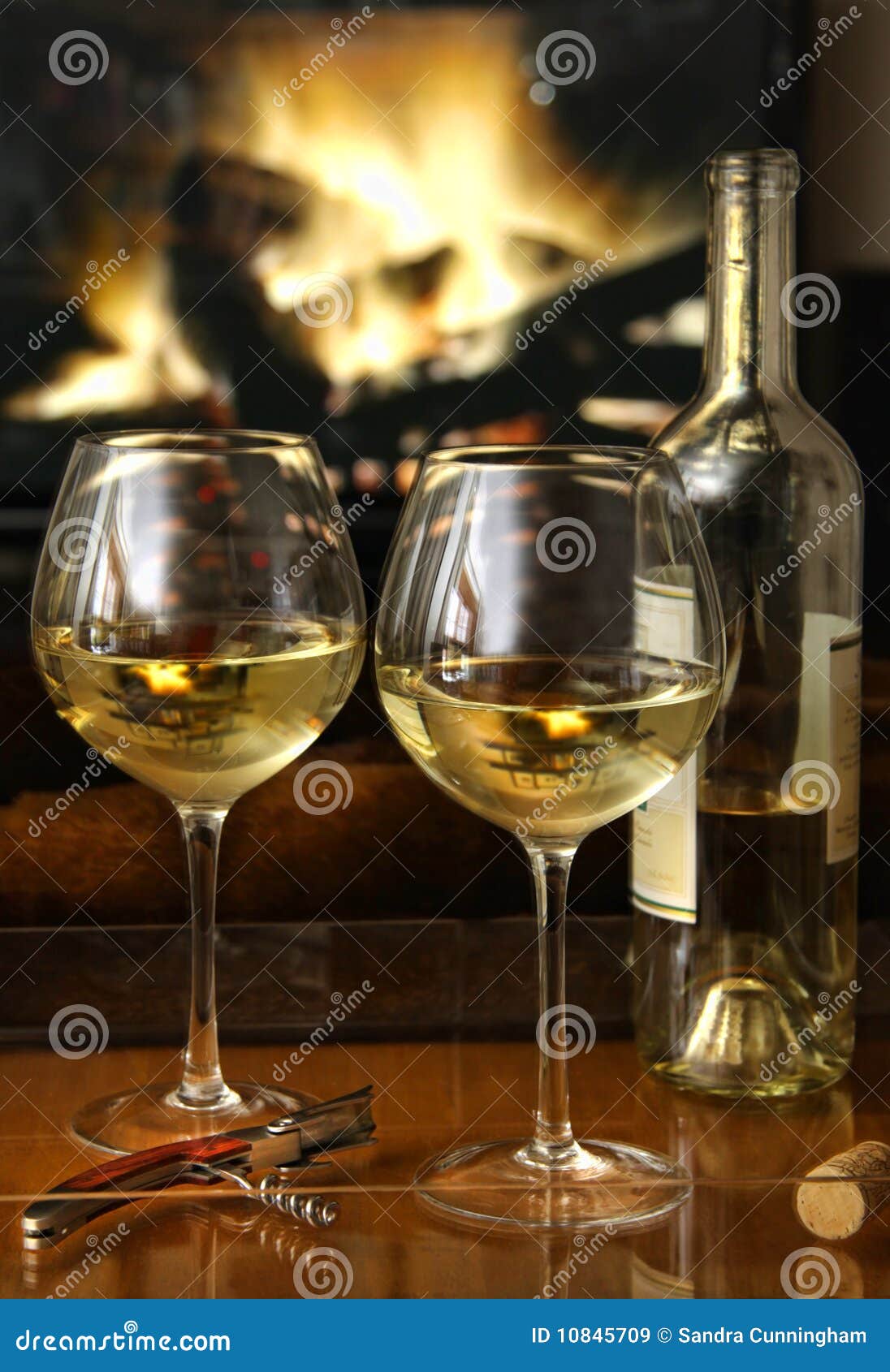 White Wine in Front of a Warm Fire Stock Image Image of bottle