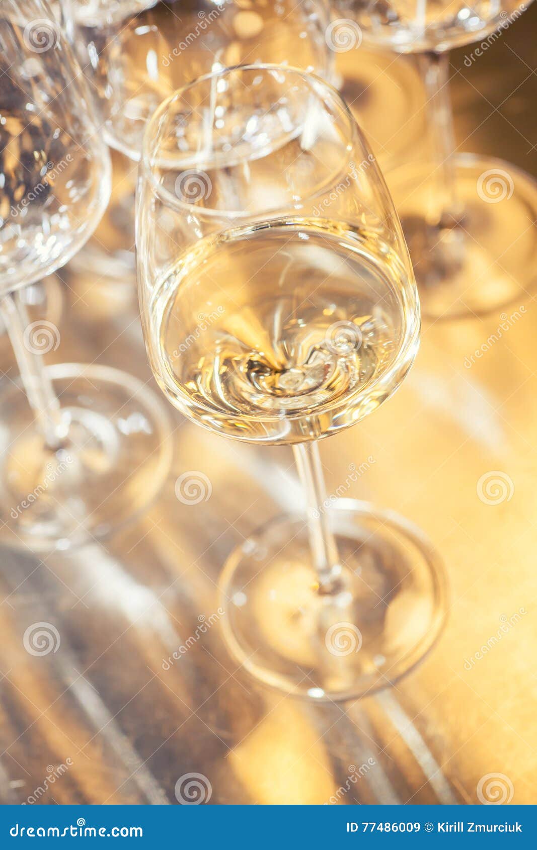 White wine glasses stock image. Image of light, time 77486009