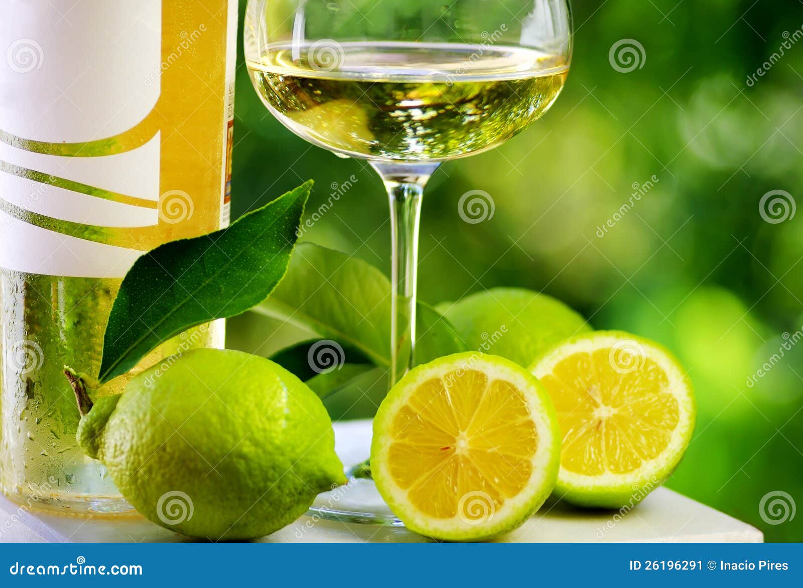 White wine and lemons. stock image. Image of color, luxury 26196291