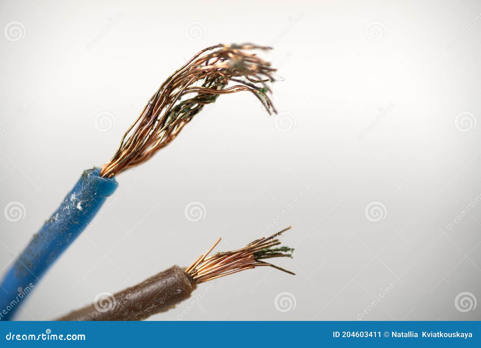 White Wire without Insulation for Power Supply Closeup. Broken