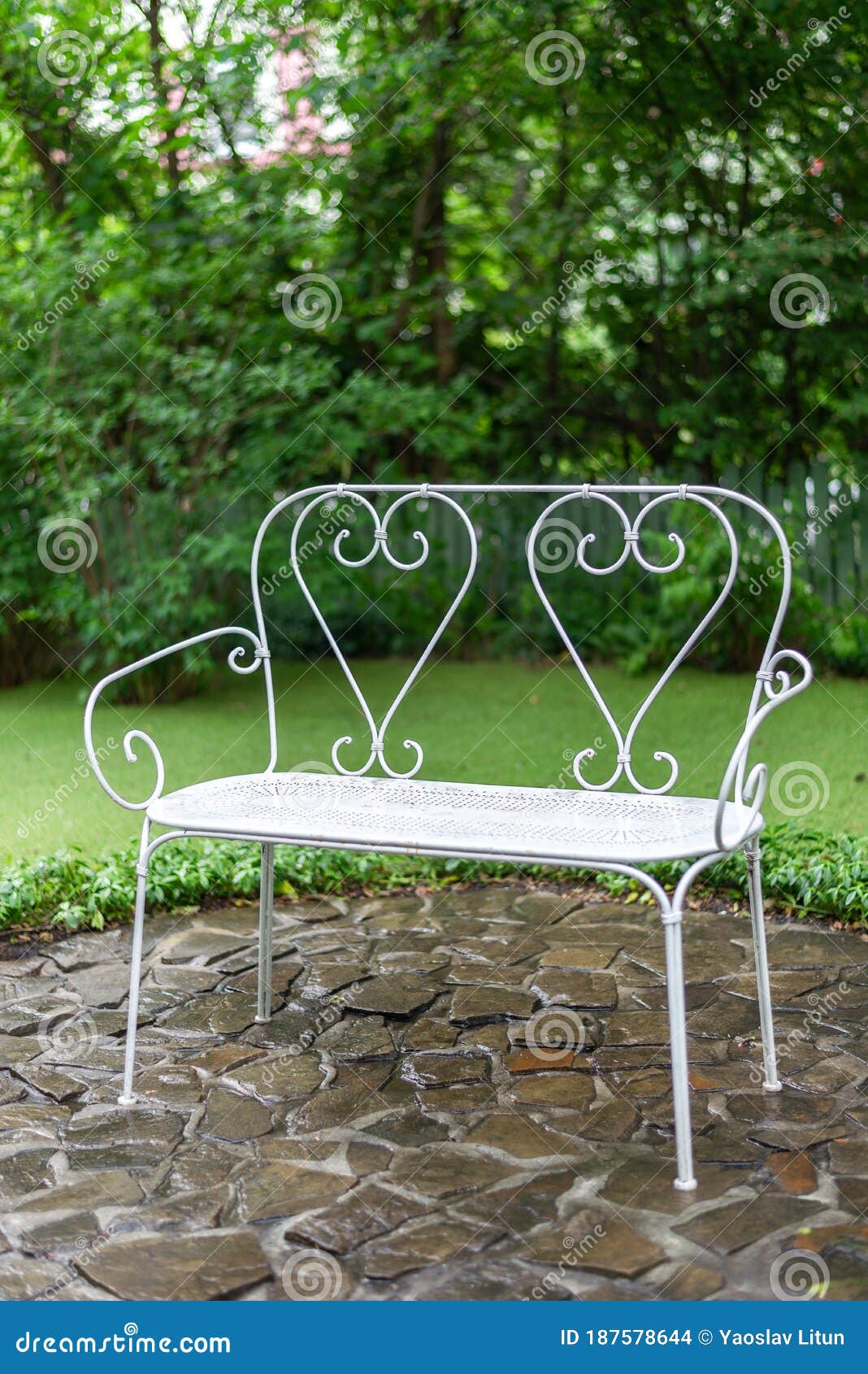 White Wrought Iron Bench in a Garden Stock Photo Image of green