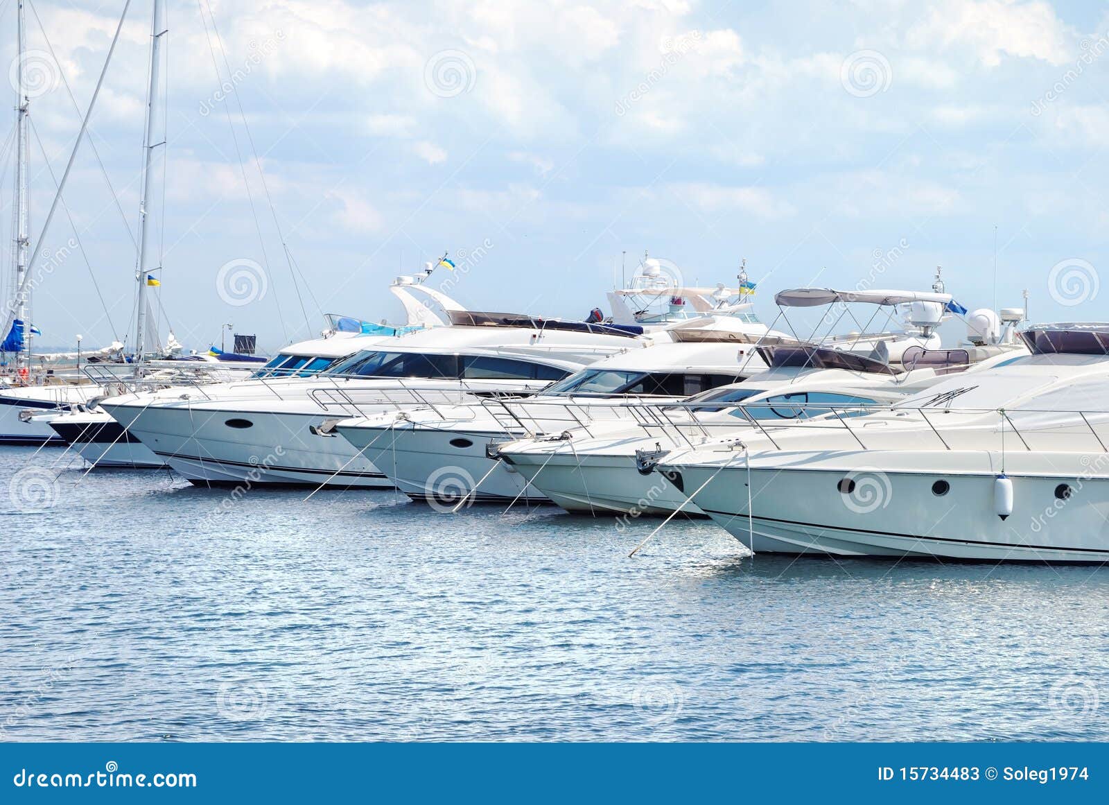 White yachts on an anchor stock image. Image of clear 15734483