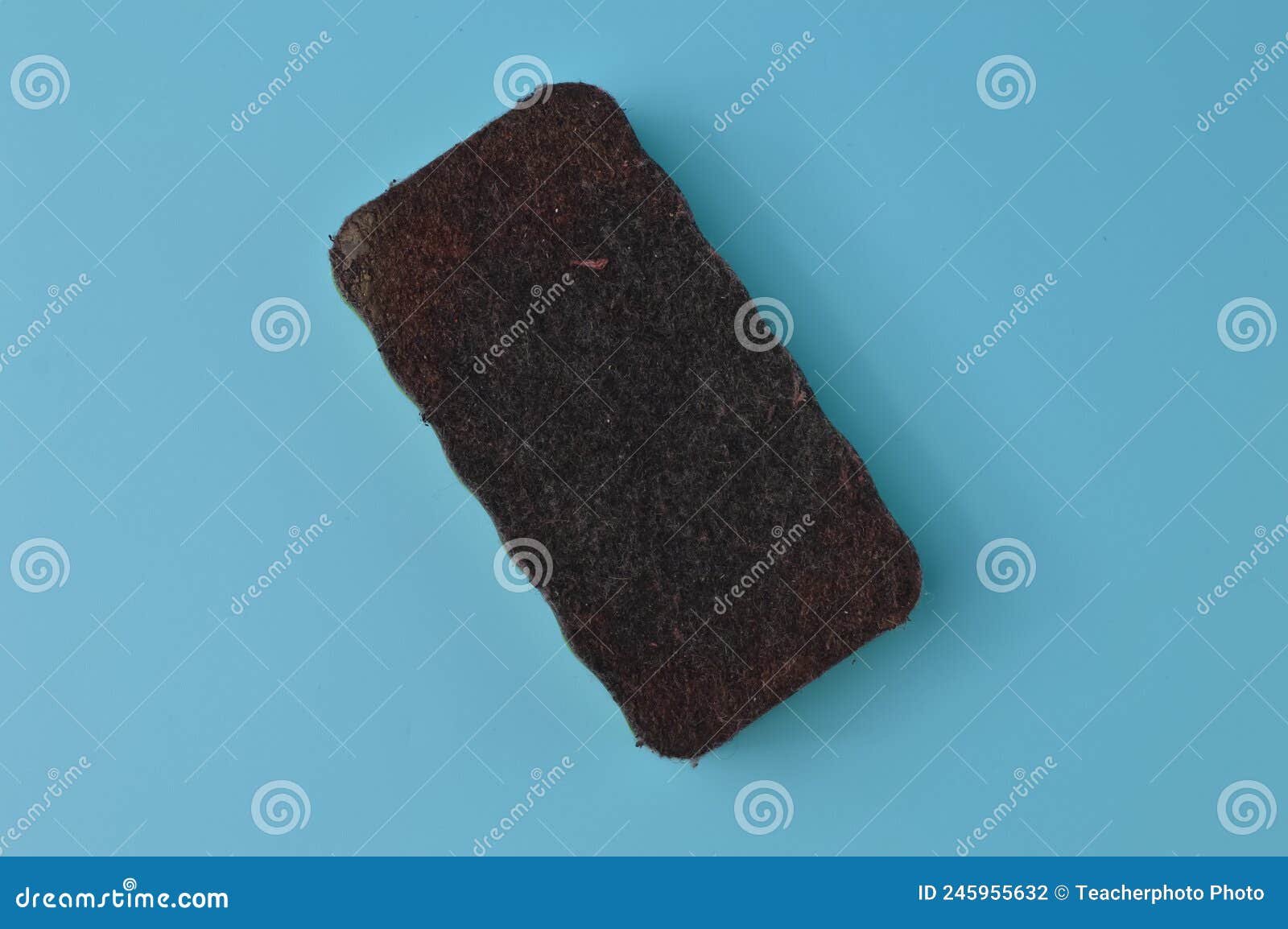 Whiteboard Brush Eraser Isolated on a Blue Background Stock Photo