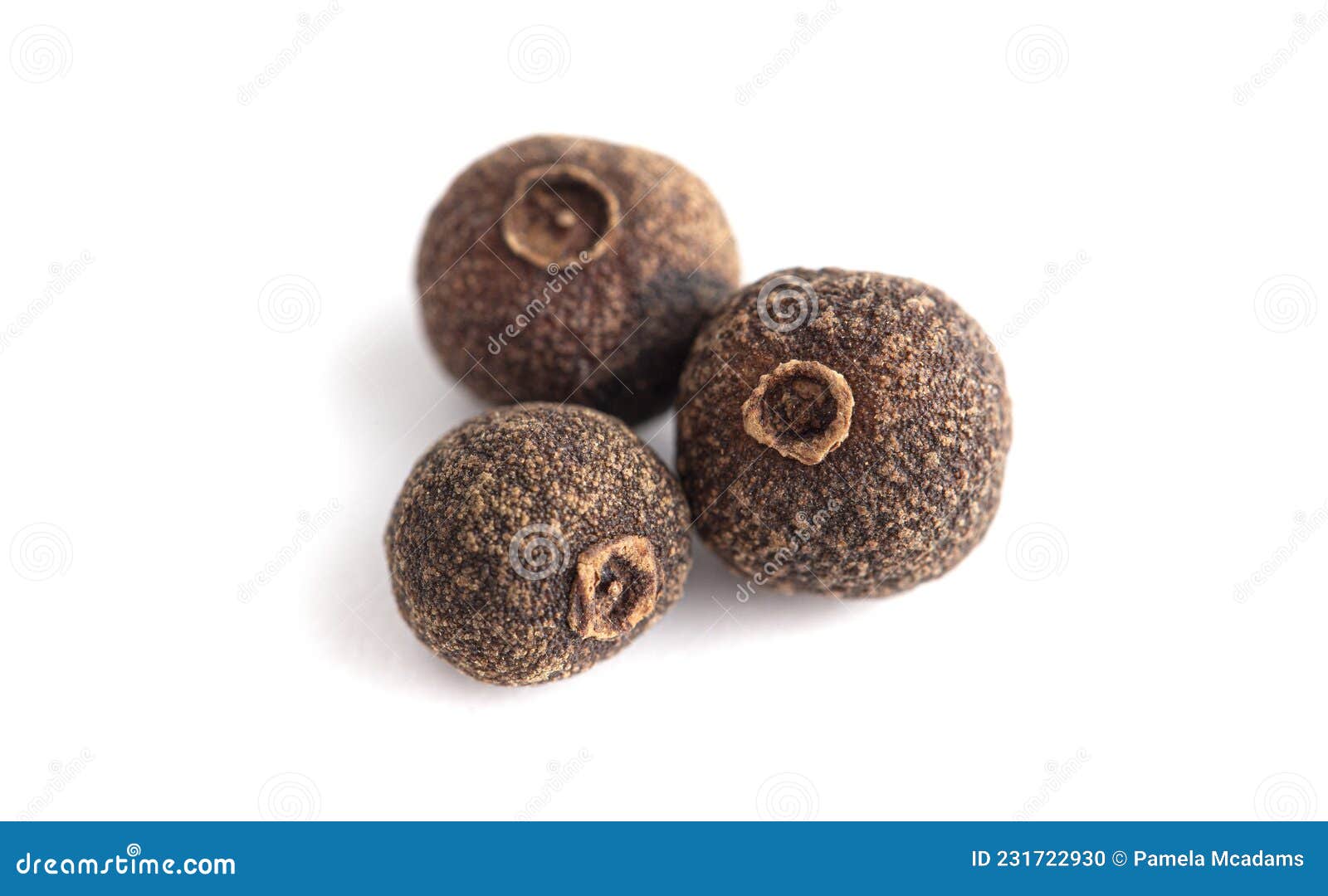 Whole Allspice Berries Isolated on a White Background Stock Photo