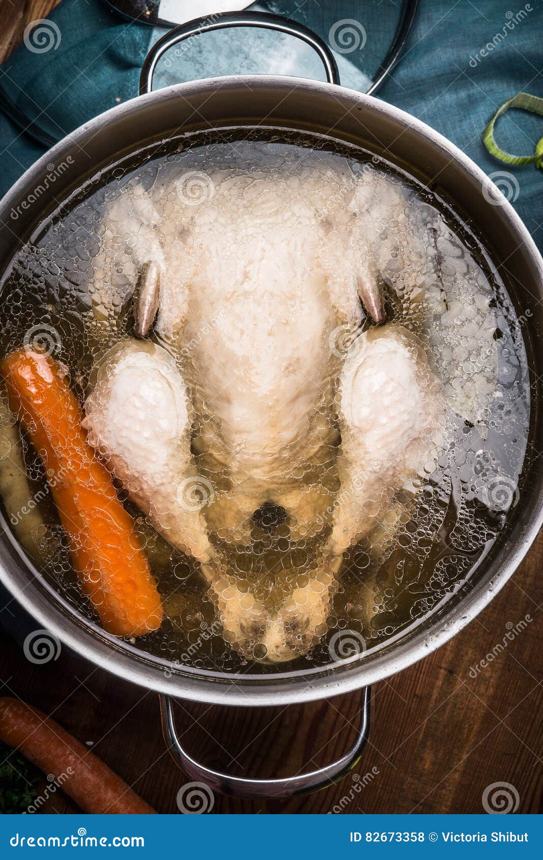 Whole Boiled Chicken in Cooking Pot with Broth, Soup Preparation Stock