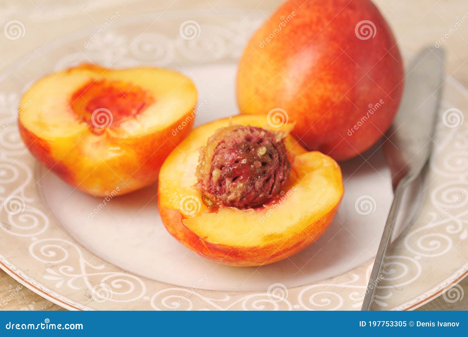 Whole and Cut Nectarine on a Plate Stock Image Image of plate, ripe