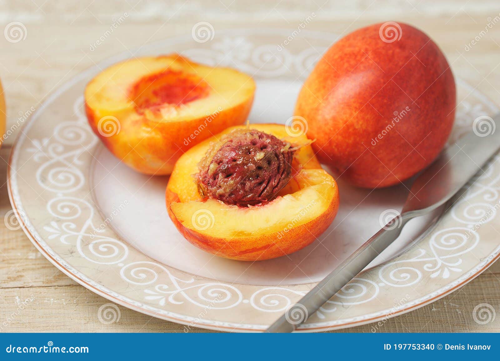 Whole and Cut Nectarine on a Plate Stock Photo Image of plate, juicy