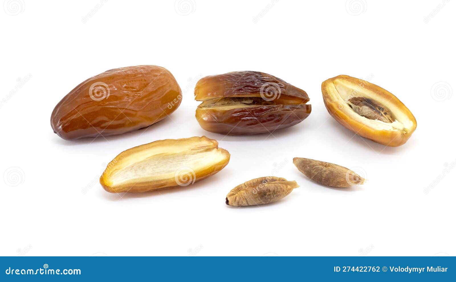 Whole Dates, Halved Dates and Date Pits on White Isolated Background