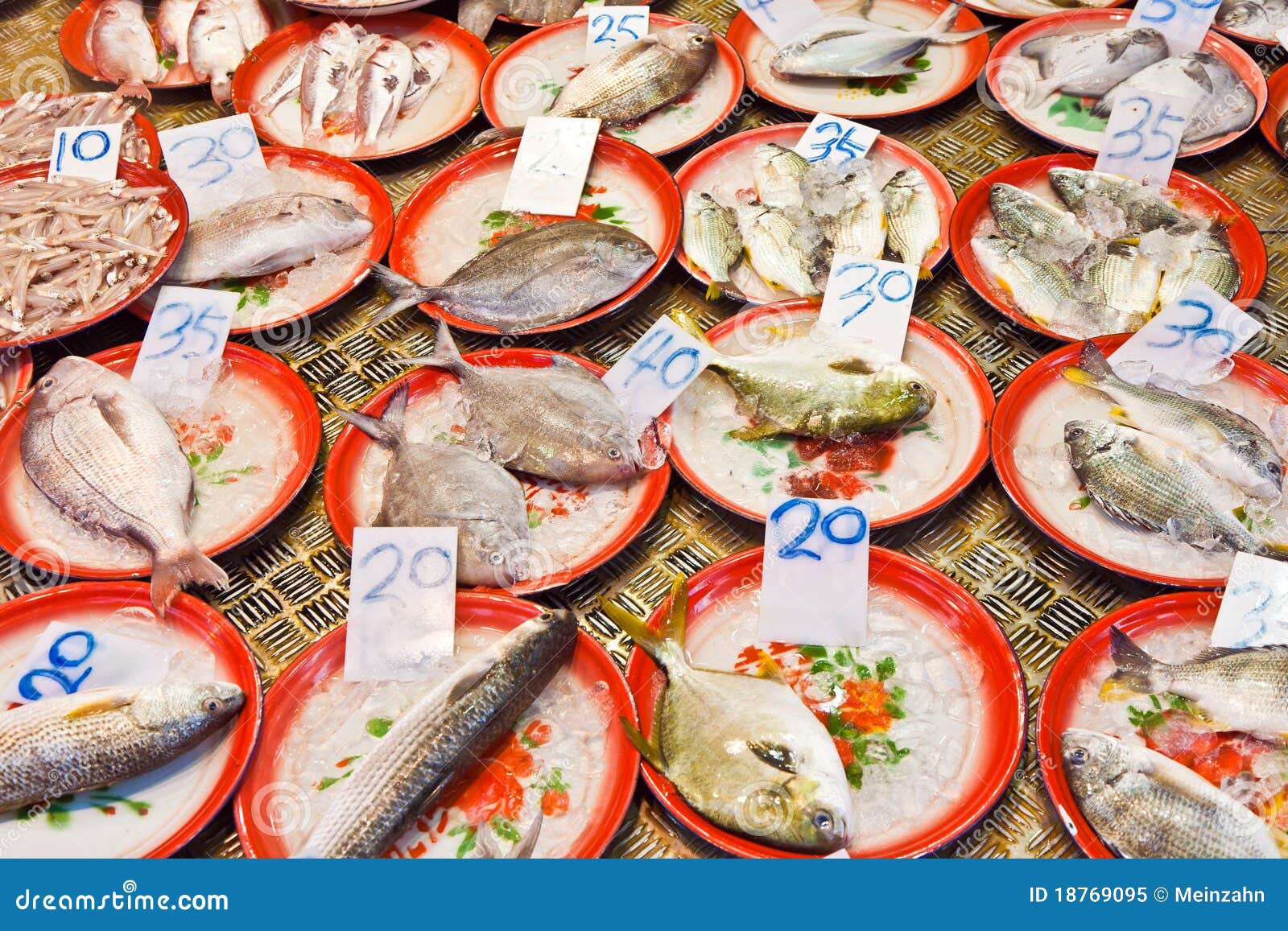 Whole Fresh Fishes Are Offered In The Fish Market Stock Image Image