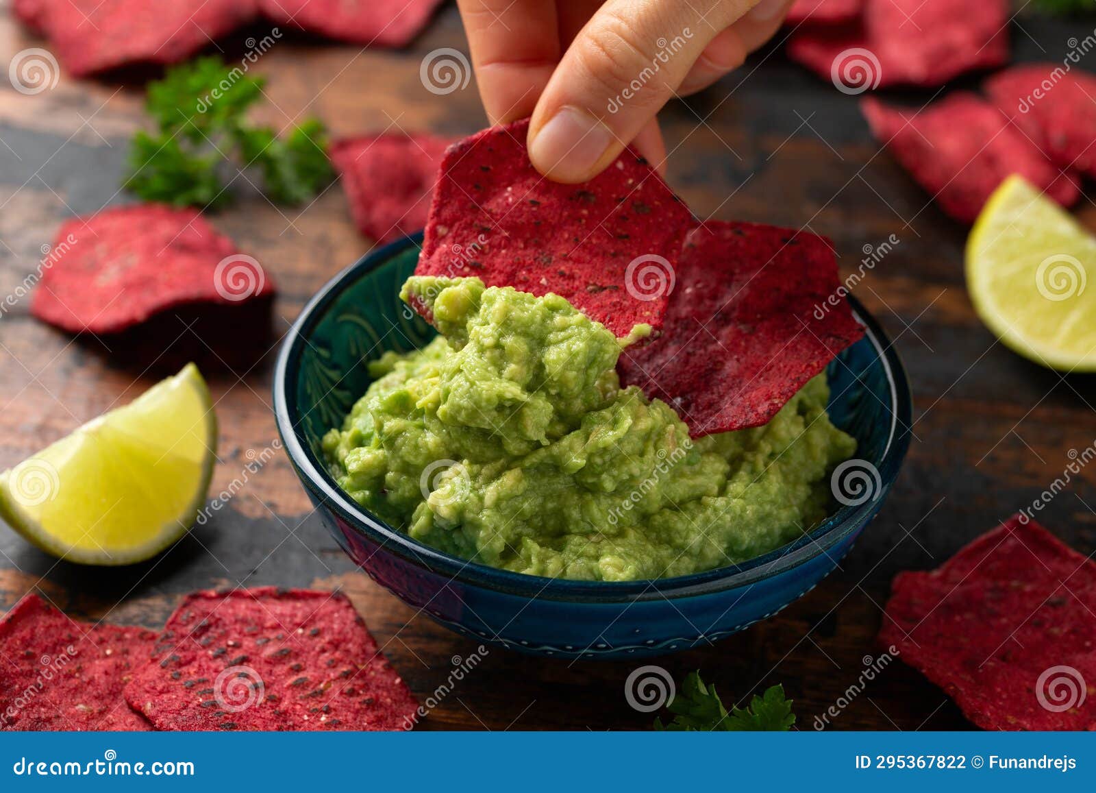 Whole Grain Beetroot Crackers with Avocado Guacamole Dip Stock Photo