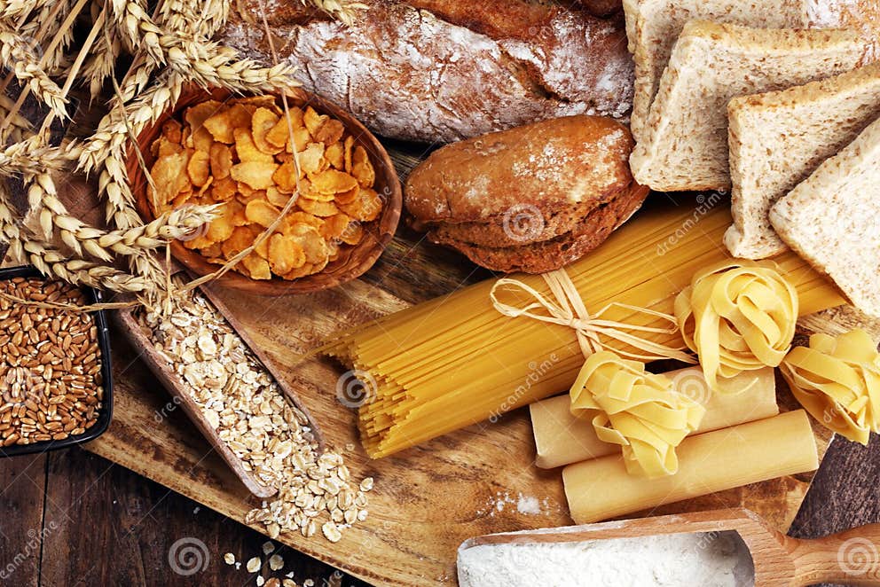 Whole Grain Products with Complex Carbohydrates on Table Stock Photo