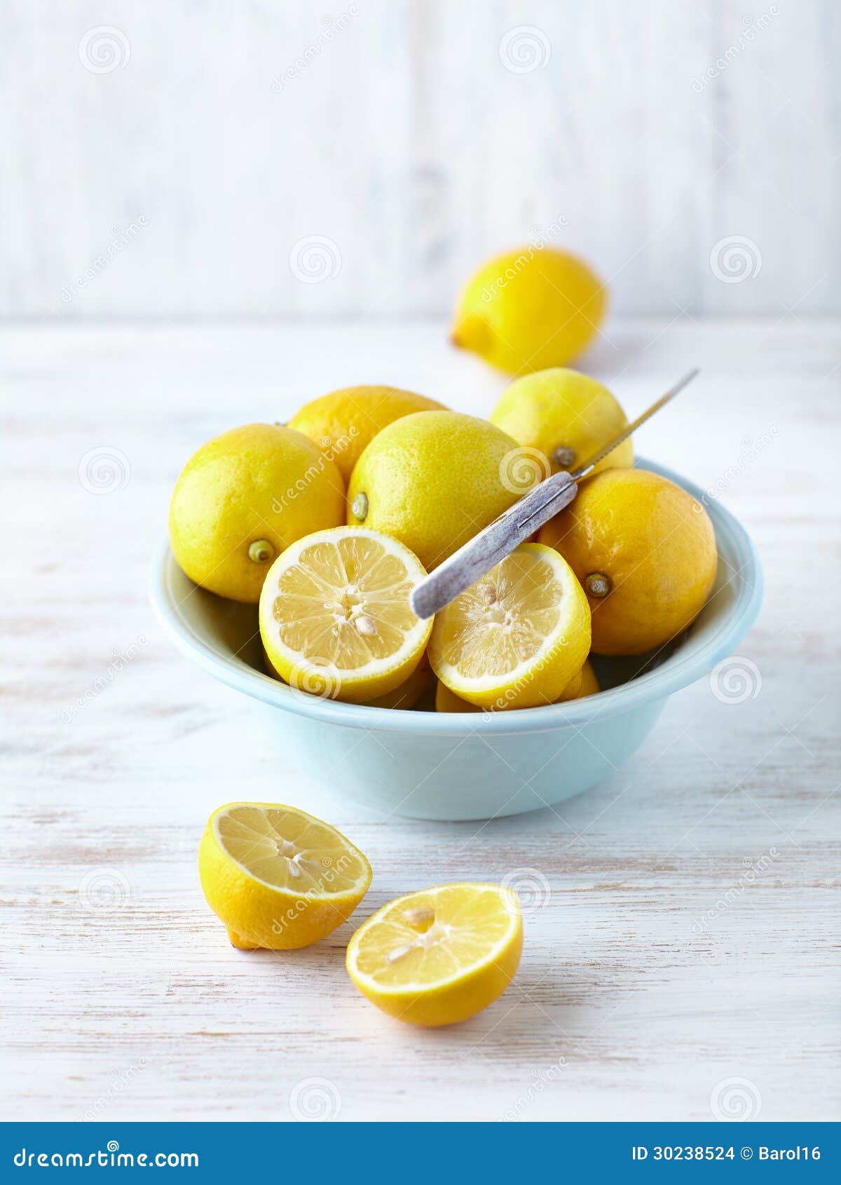 Bowl of fresh lemons stock photo. Image of dishware, closeup 30238524