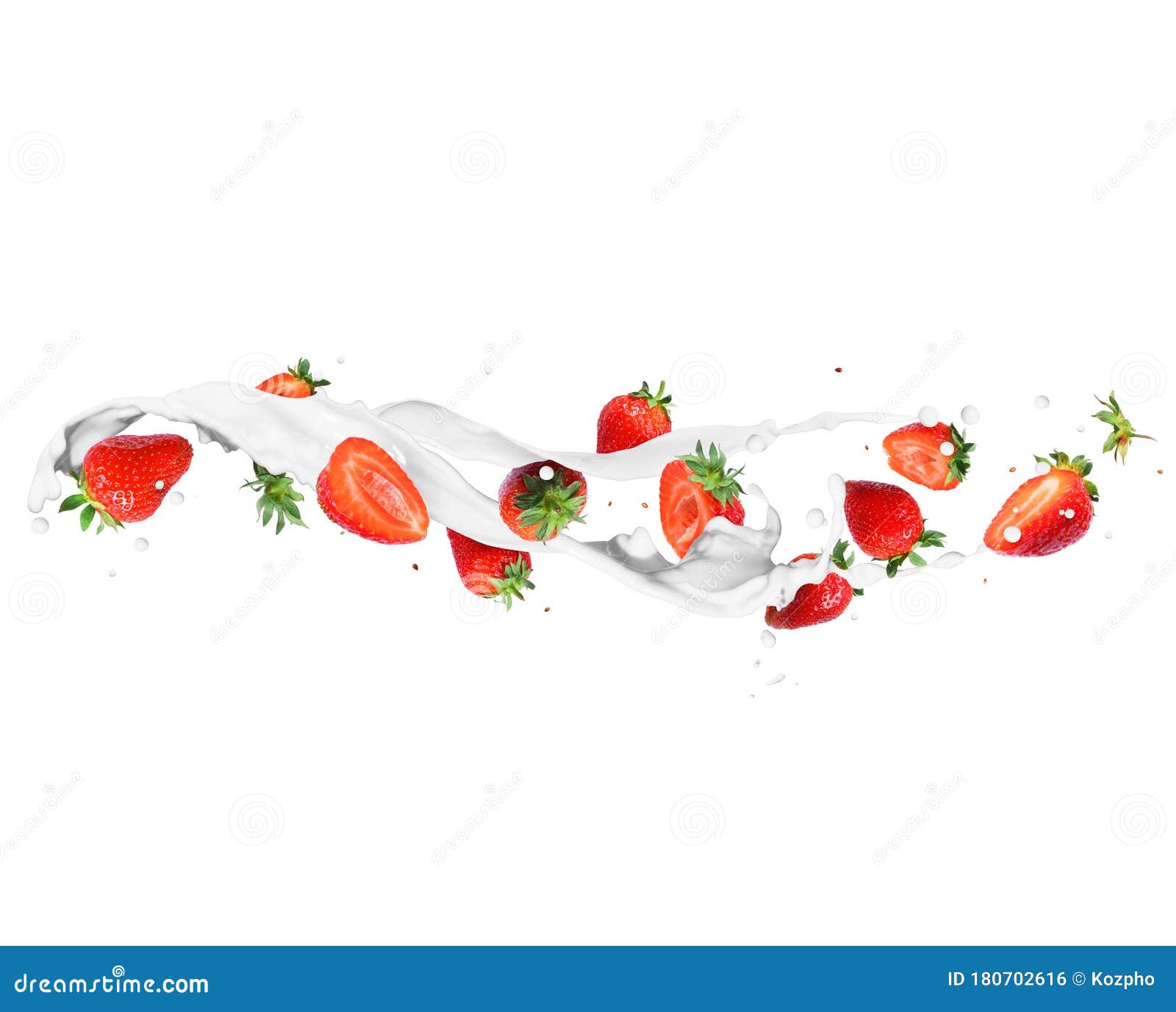 whole and sliced strawberries with milk splashes