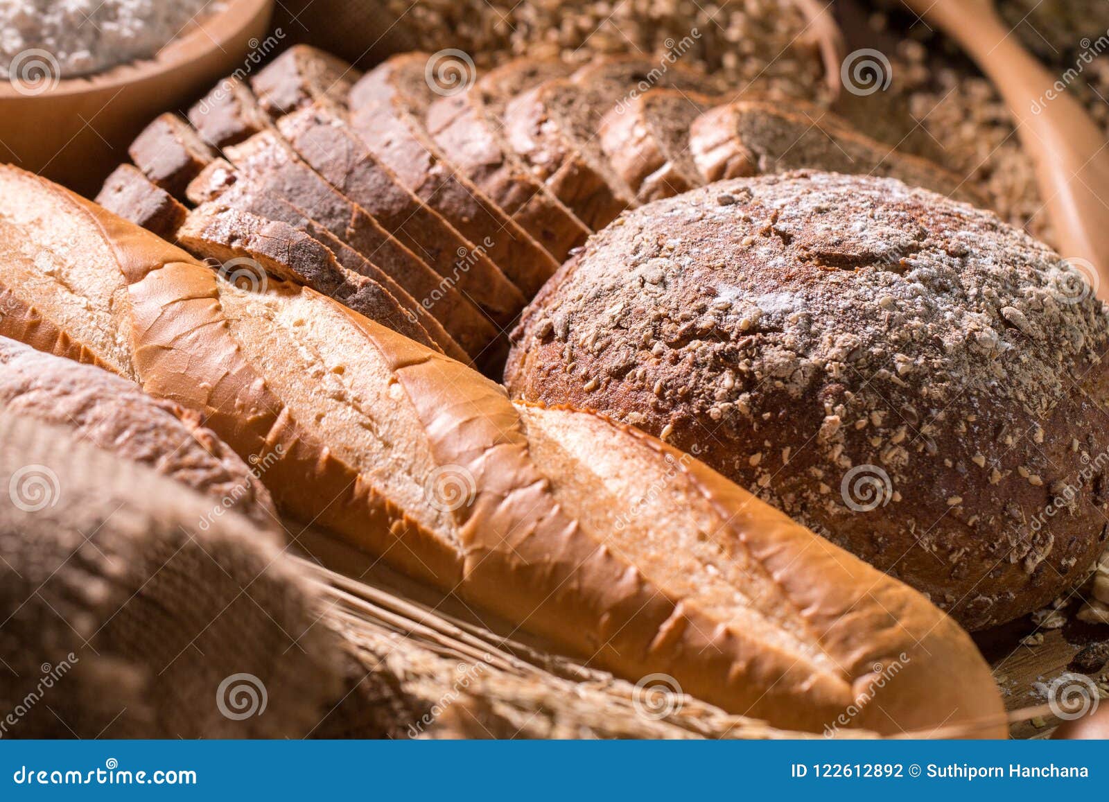 Whole Wheat Bread and Eggs on Wood Table. Stock Photo Image of