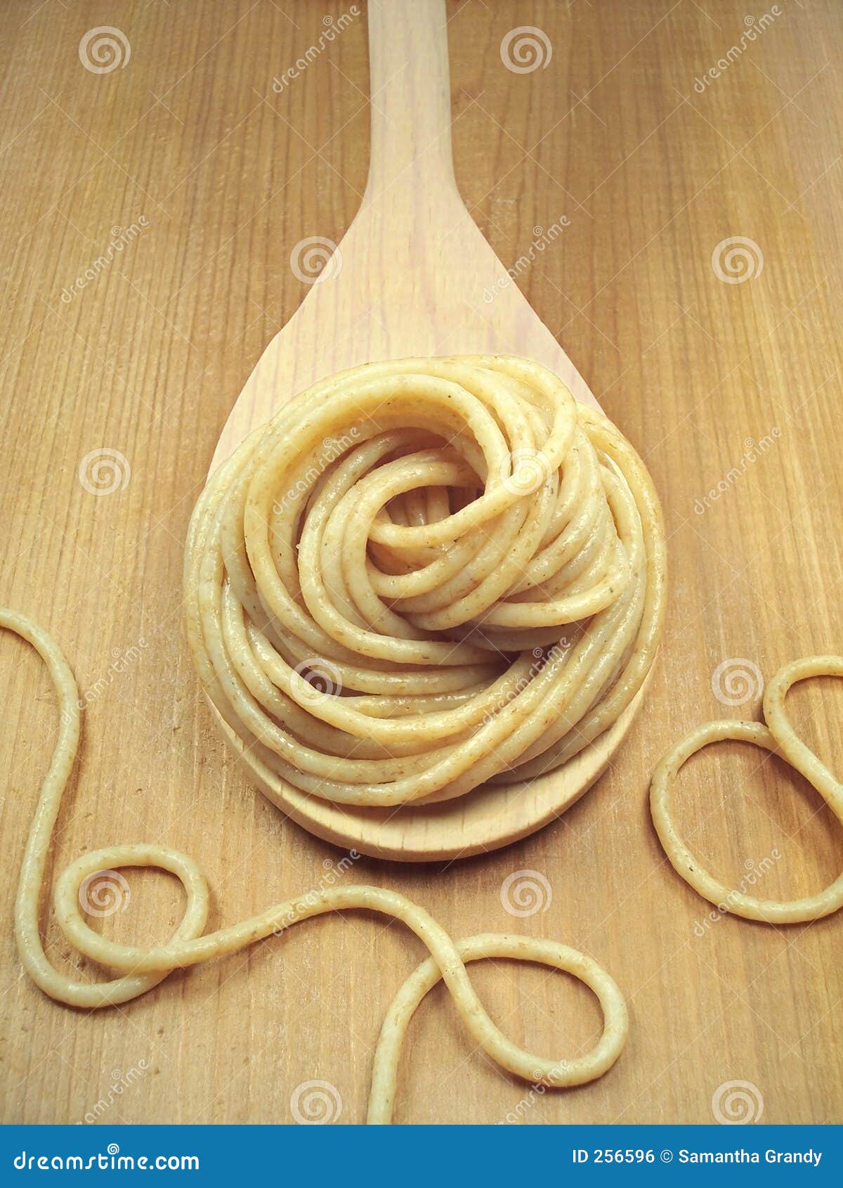 Whole Wheat Pasta on Spoon stock photo. Image of staple 256596