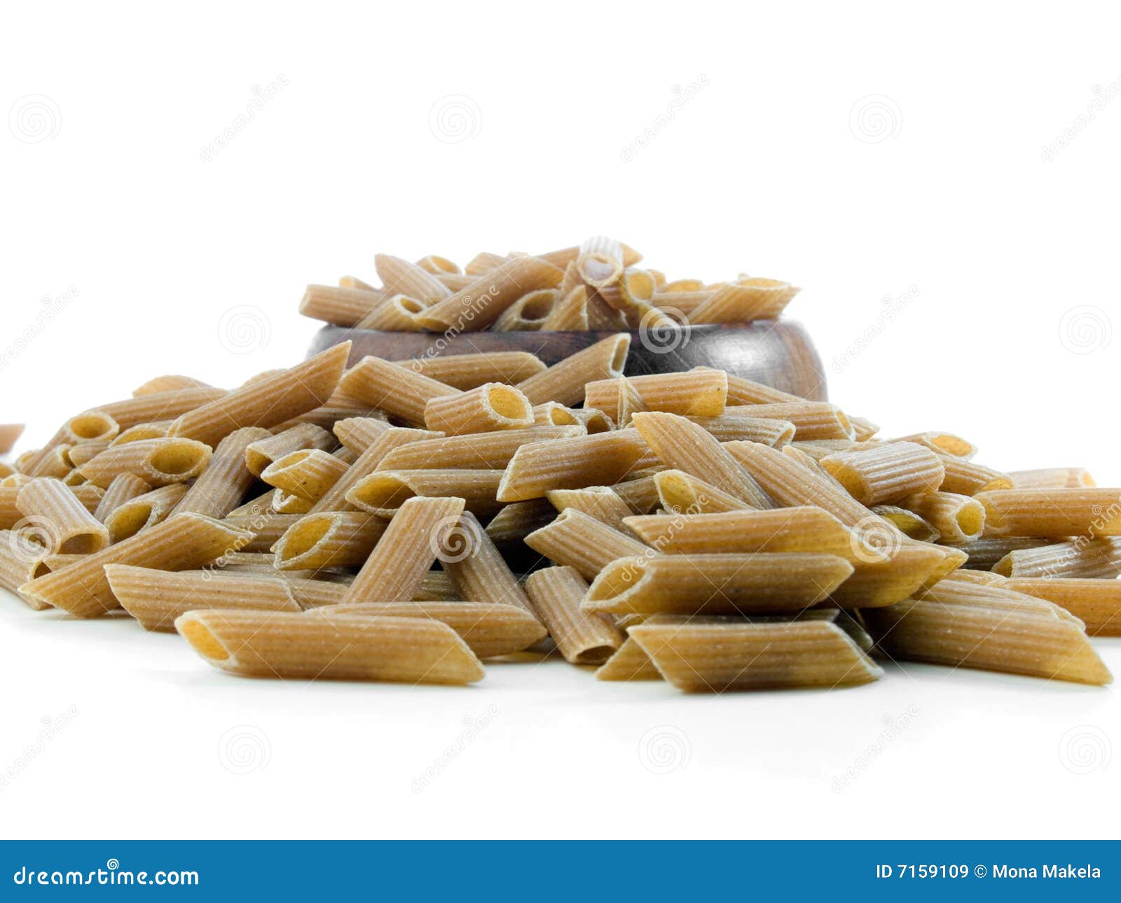 Whole wheat penne pasta stock image. Image of fiber, grains 7159109