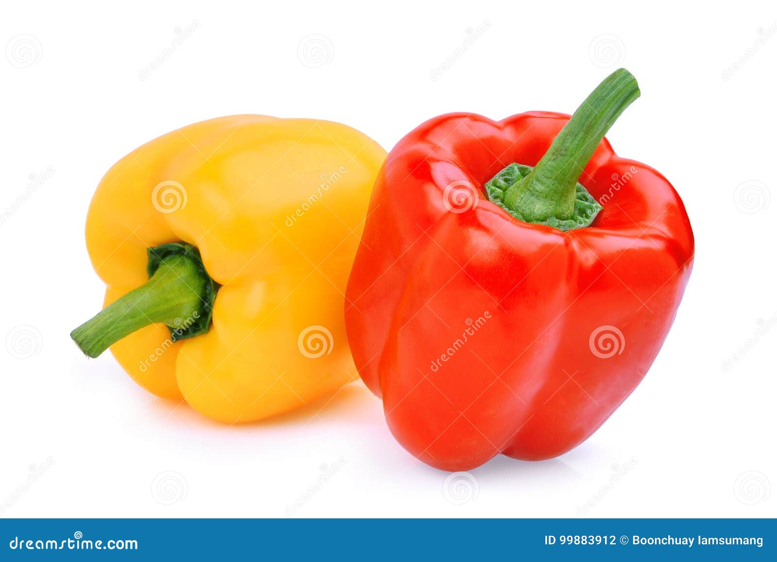whole of yellow adn red sweet bell pepper or capsicum 