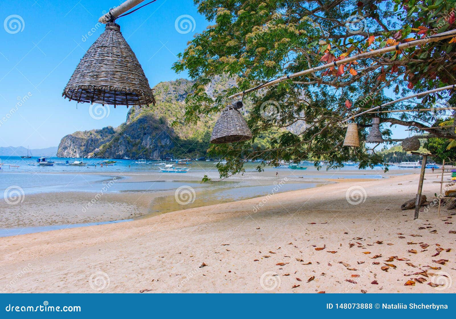 Wicker Lamps Hanging from Trees on the Beach, Philippines. Decoration of  Outdoor Lanterns on Seacoast. Tropical Vacation. Stock Photo - Image of  outdoor, lanterns: 148073888