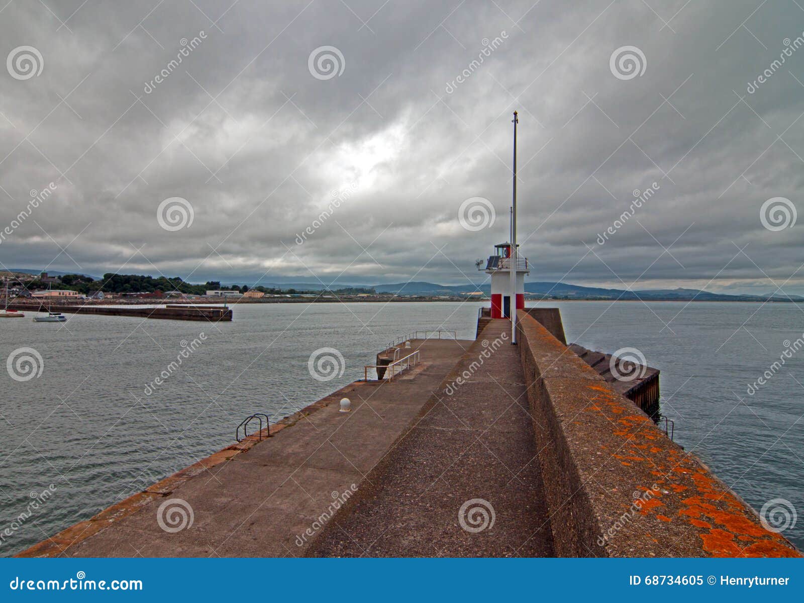 Wicklow Ireland Harbor Jetty Breakwater Wall and Lighthouse Stock