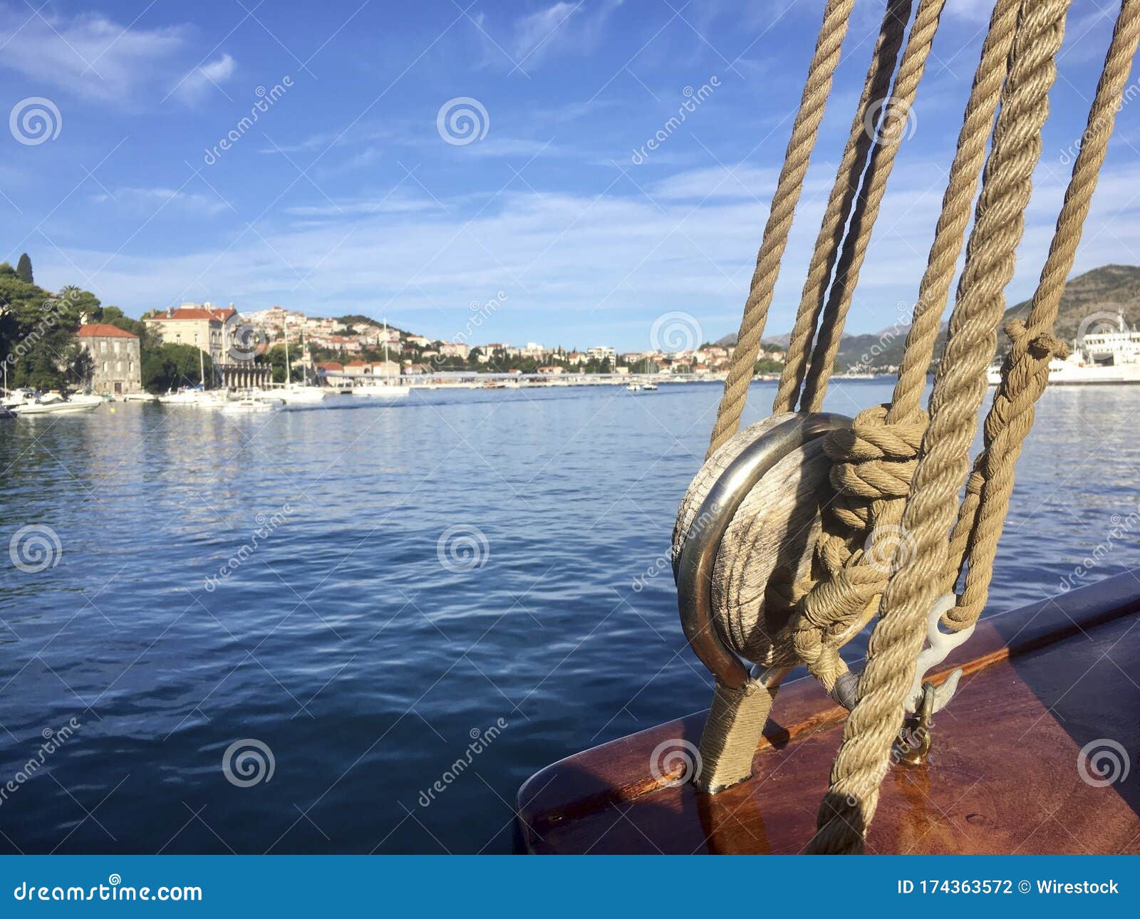 wide angle shot from an old sailboat winch and ropes in port gruÃÂ¾, dubrovnik, croatia