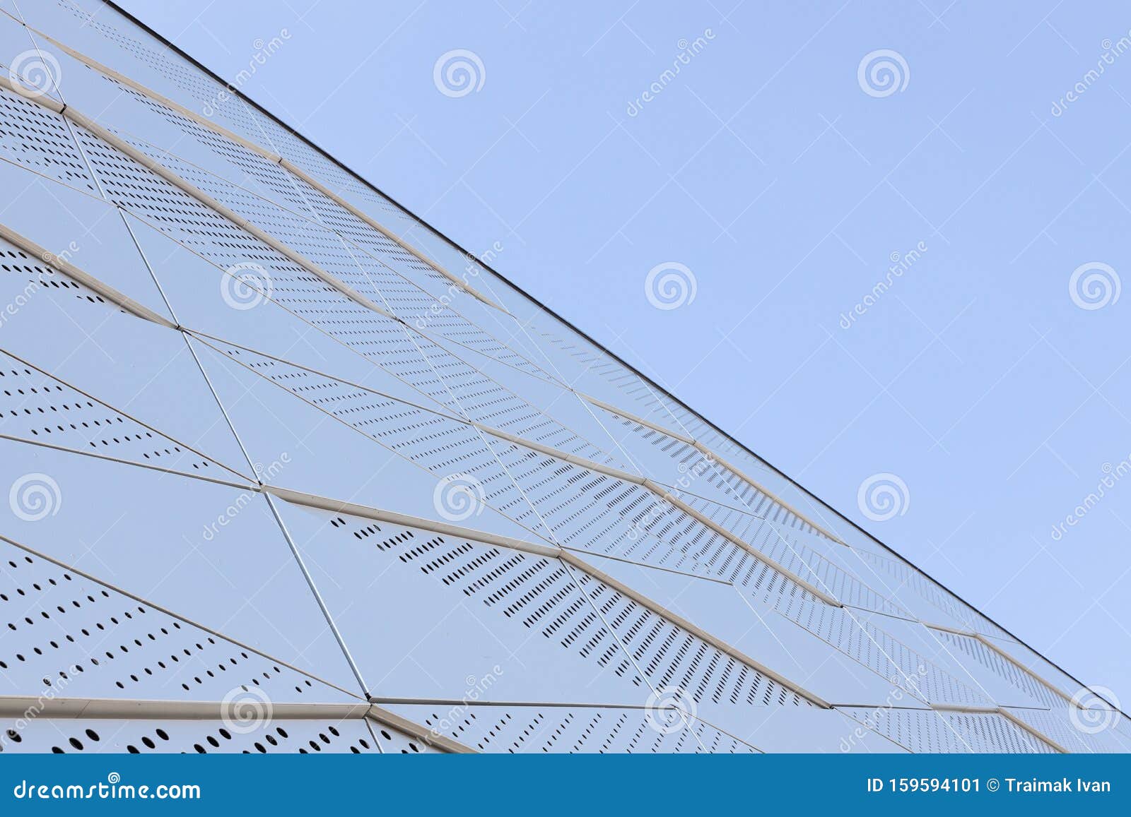 Wide Angle View of Metal Wall with Triangular Pattern and Round ...