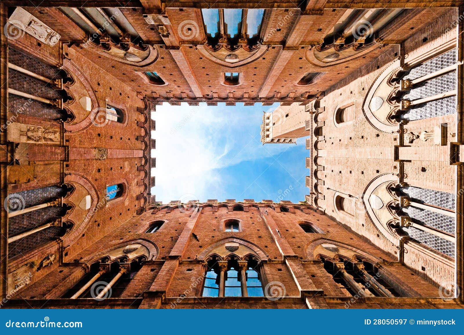 wide angle view of torre del mangia, siena, italy