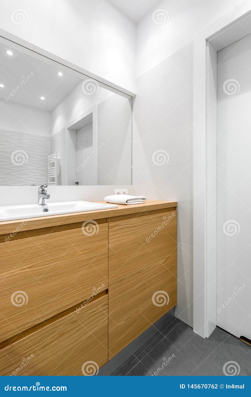 White Bathroom Interior With Wooden Furniture Stock Photo Image