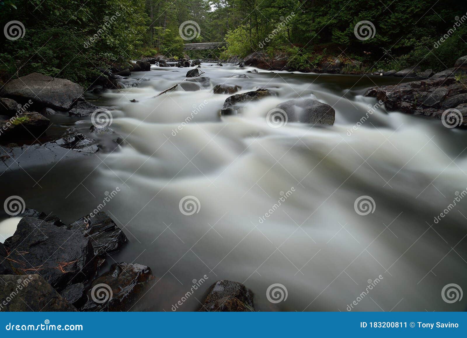 serene scenic pike river rapids through large granite boulders marinette county wisconsin