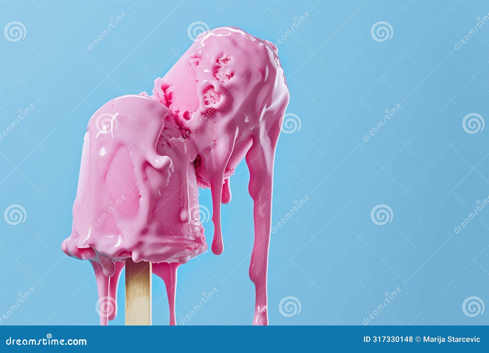 wierd home made strawbery ice cream on the stick  on a blue background