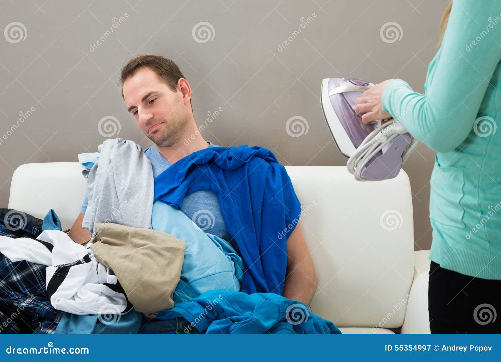 Wife Giving Ironing Work To Husband Stock Image Image of boredom