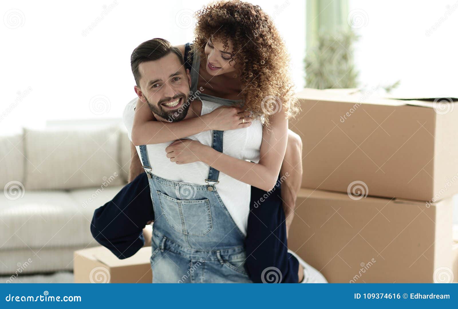 Wife Hugs Her Husband In A New Apartment Stock Photo Image Of H