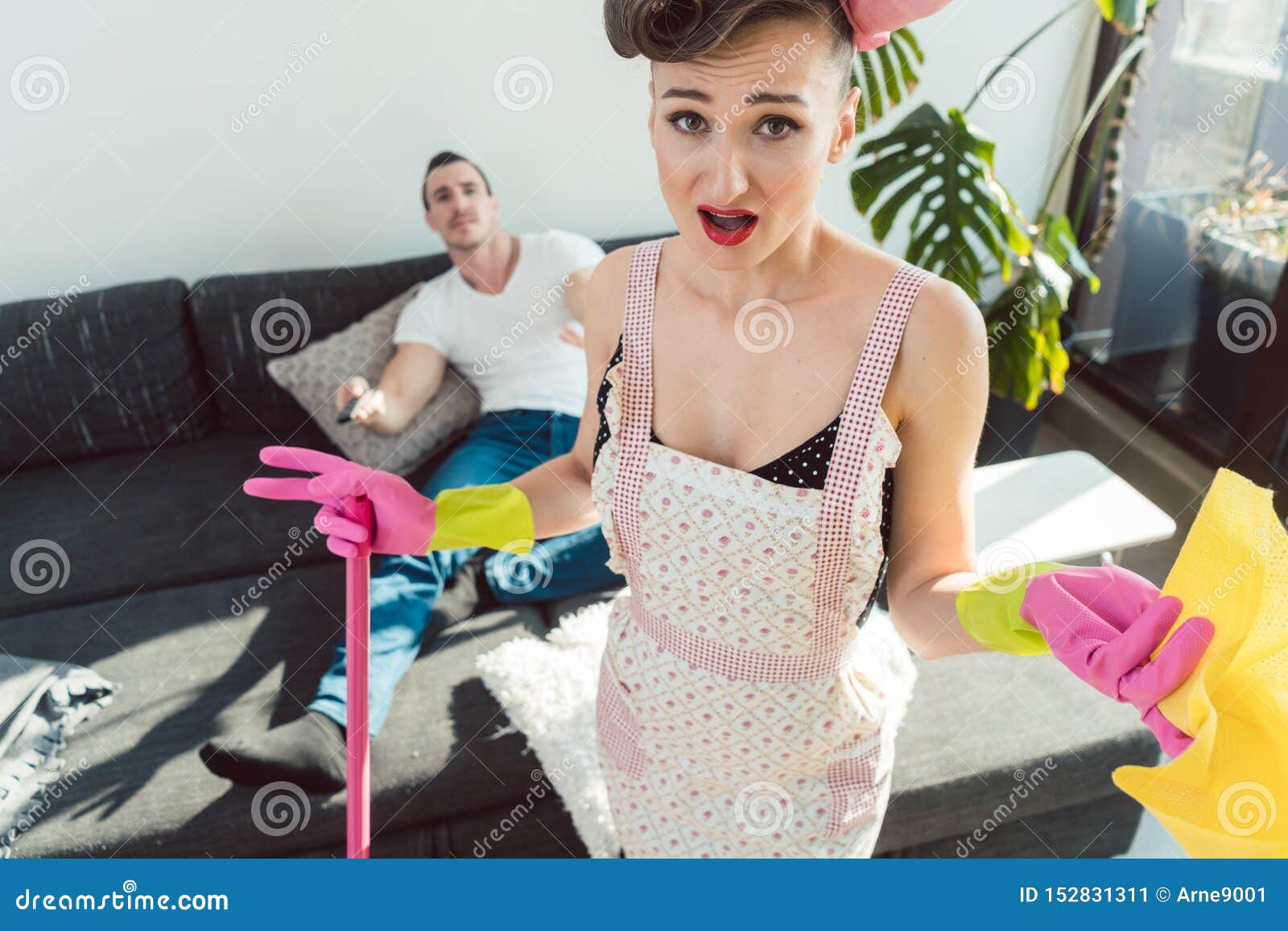 Wife Is Mad At Her Lazy Husband Who Is Not Helping With Chores Stock Image Image Of Housework