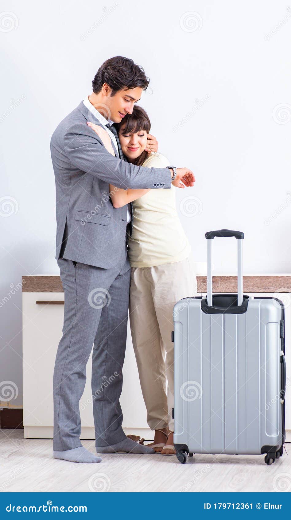 Wife Seeing Her Husband Off To Business Trip Stoc