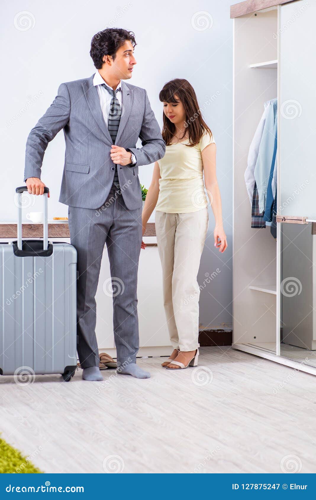 The Wife Seeing Her Husband Off To Business Trip Stoc