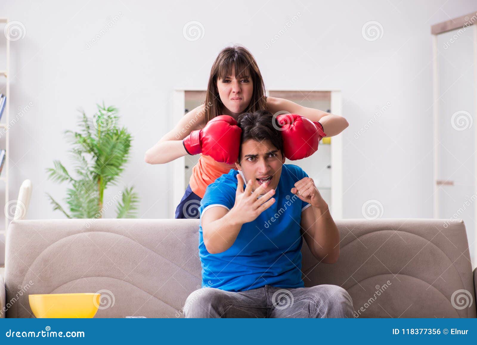 The Wife Unhappy that Husband is Watching Boxing Stock Photo Image of