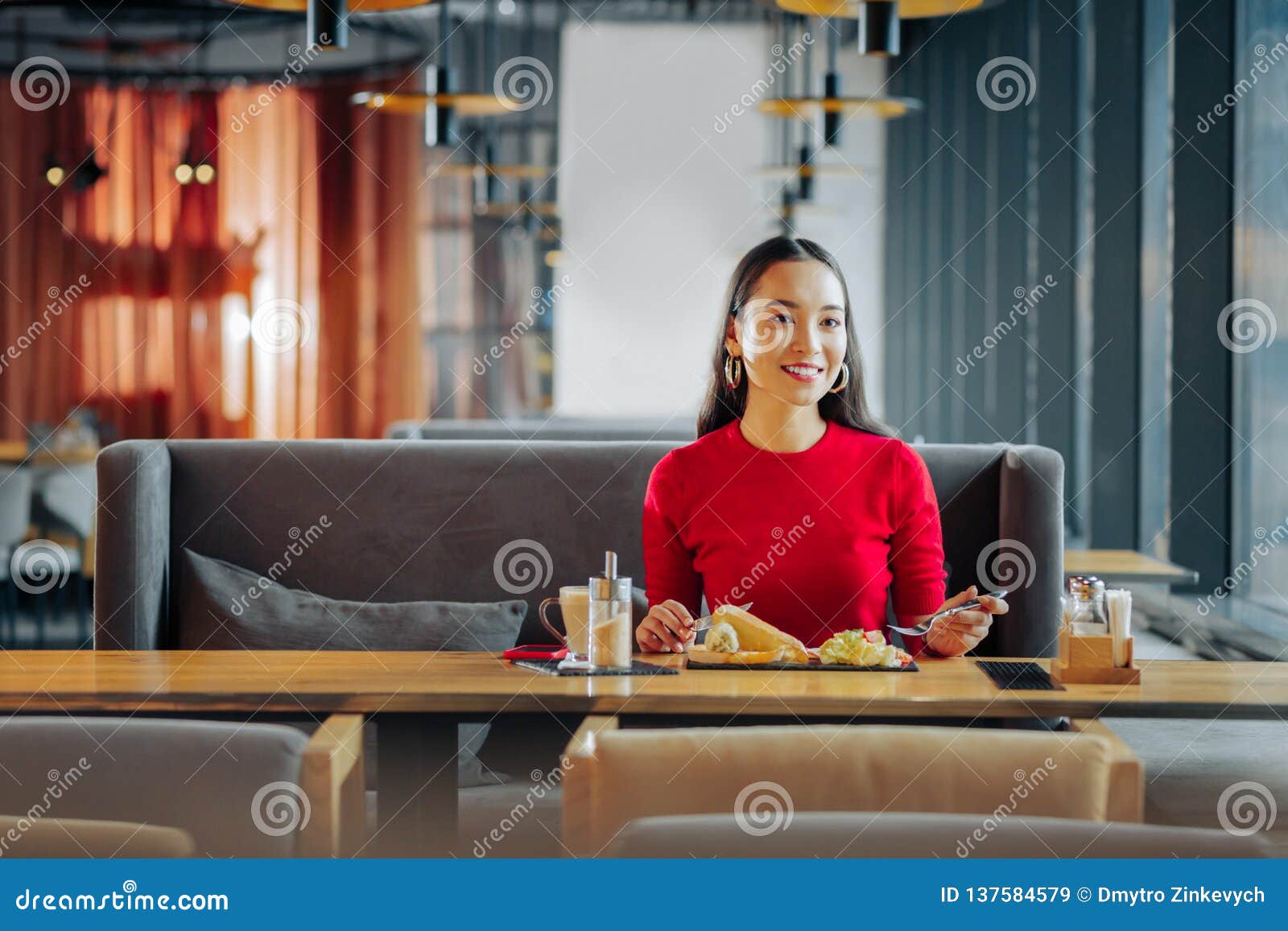 Wife Waiting For Her Husband While Eating Breakfast In Restaurant Stock 