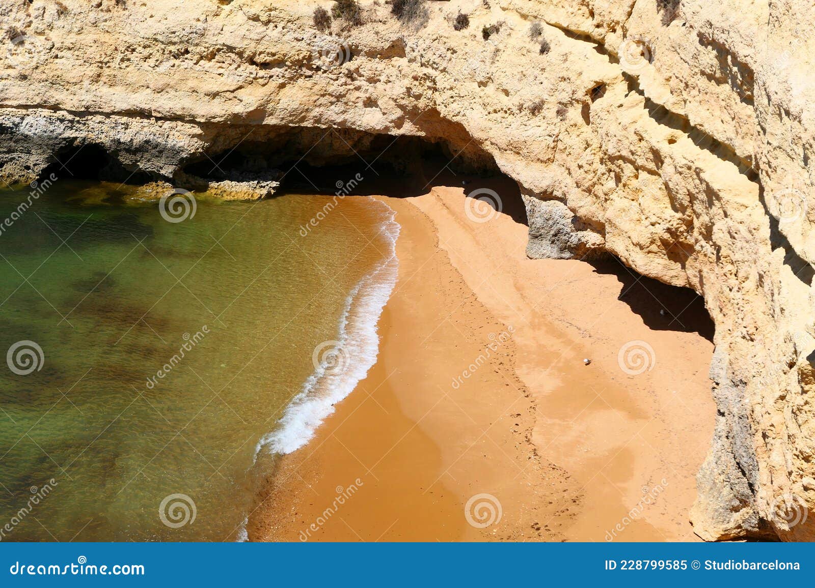 wild beach in algarve, portugal