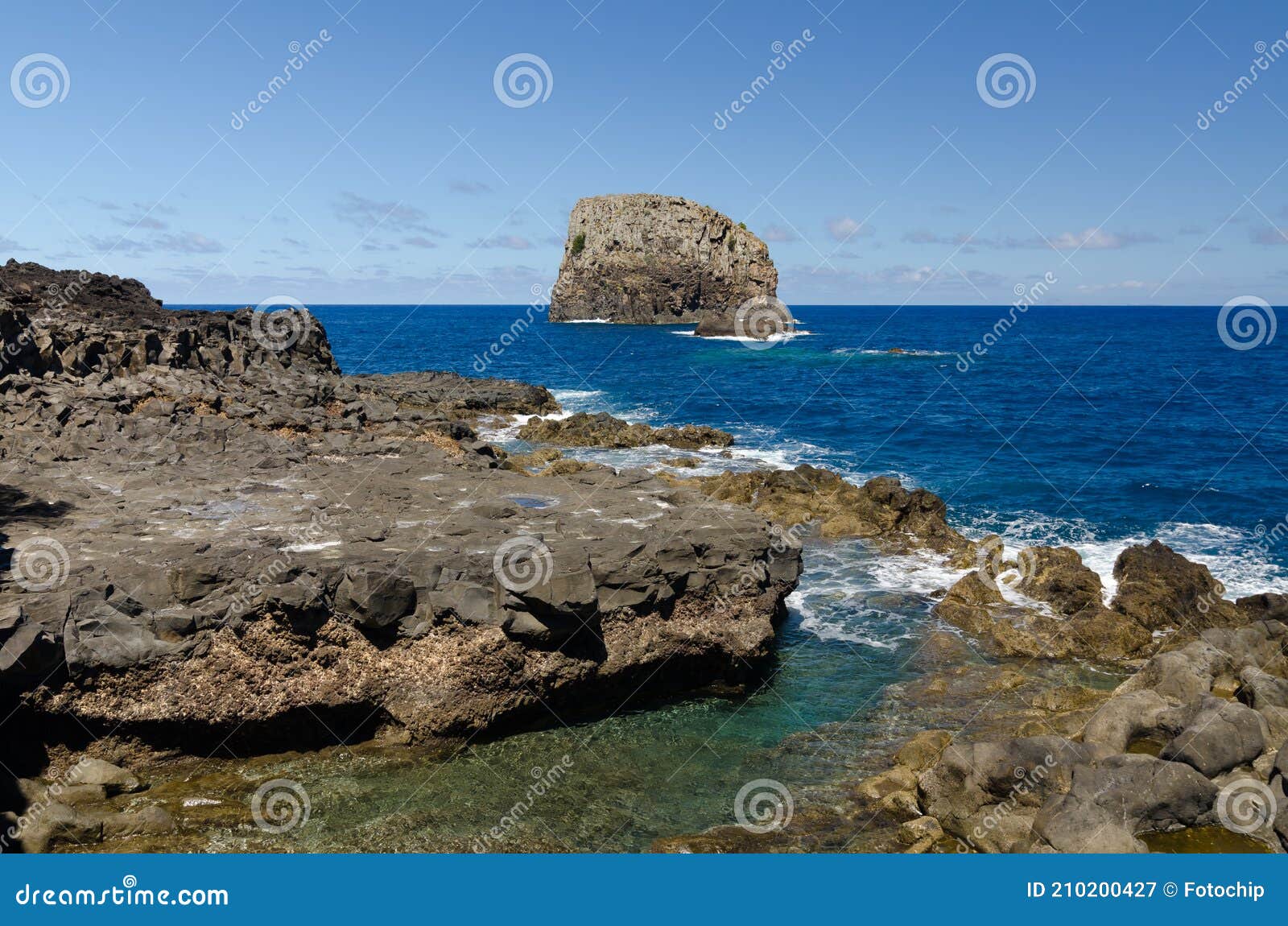 wild rocky coast near village porto da cruz, madera, portugal