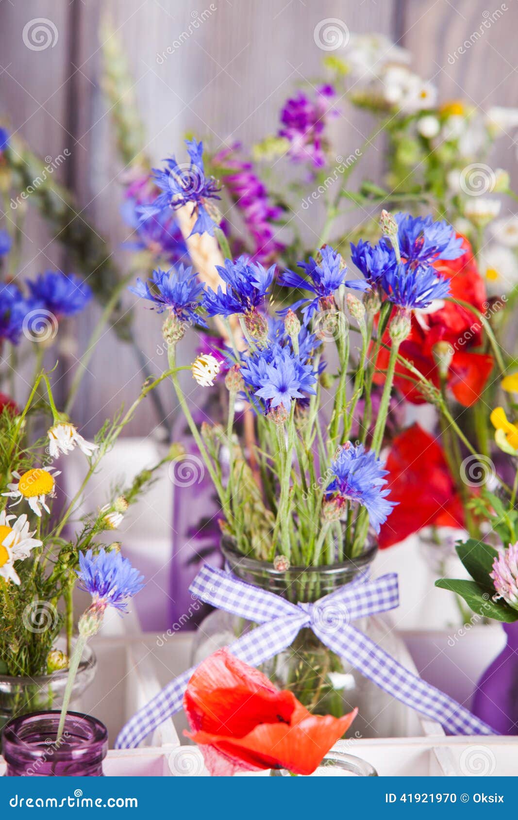 Wildflowers in bottles stock photo. Image of summer, floral 41921970