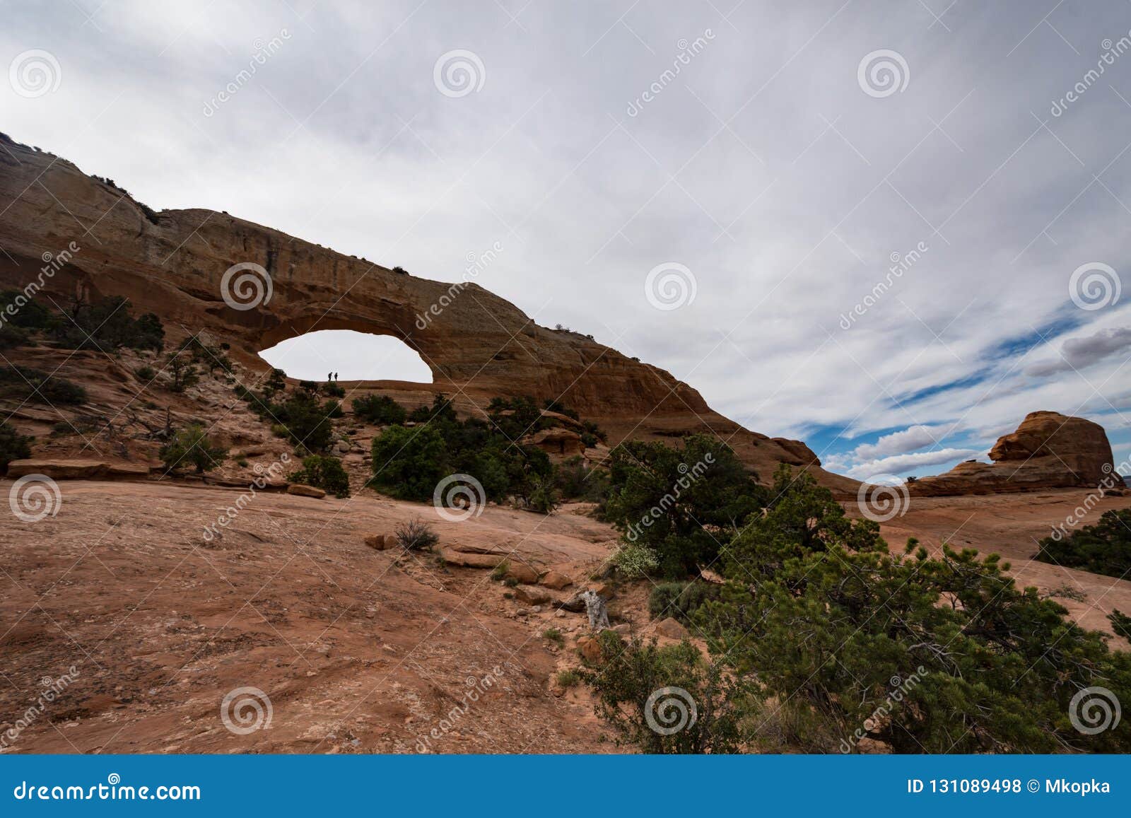 wilson arch, located in dry valley utah, is an entrada standstone formation