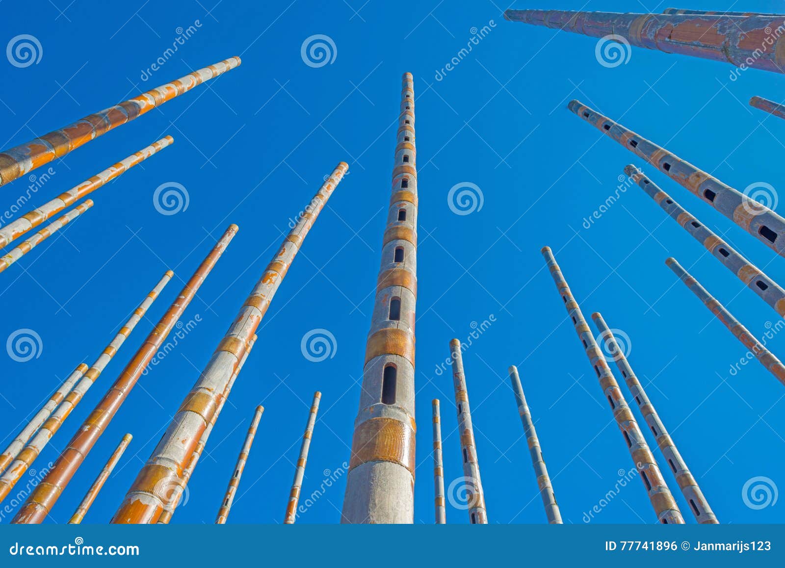 Wind chime in a blue sky stock photo. Image of flute 77741896