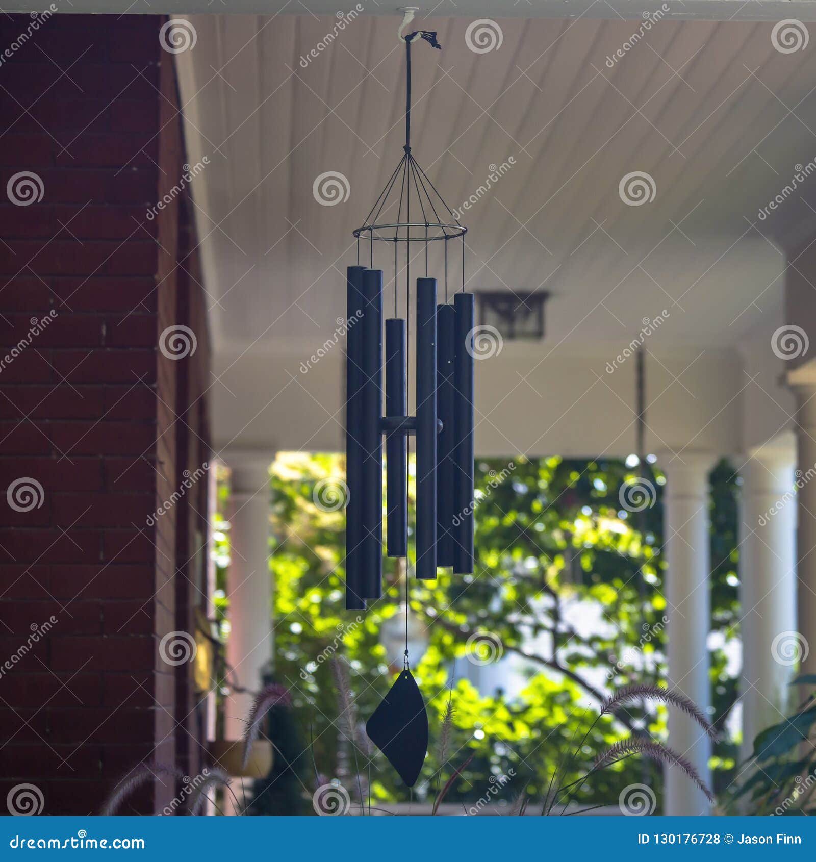 How to Hang Wind Chimes on Brick Wall 